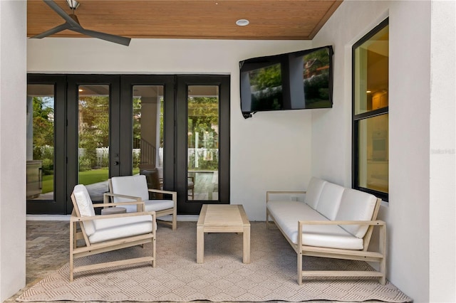 view of patio / terrace featuring french doors and ceiling fan