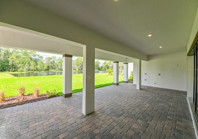 view of patio / terrace featuring a water view