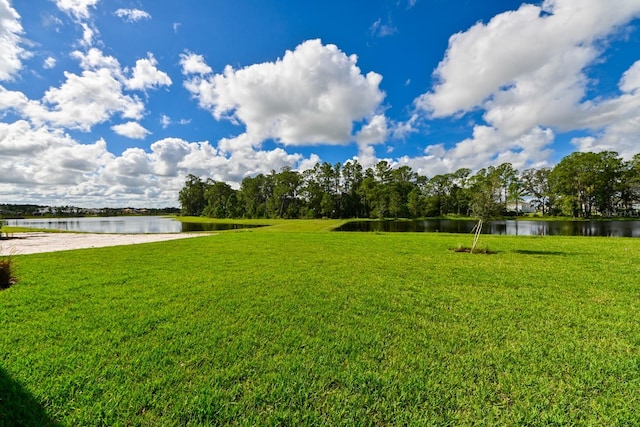 view of yard with a water view