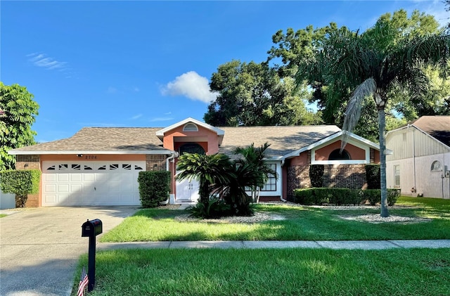 ranch-style house with a garage and a front lawn