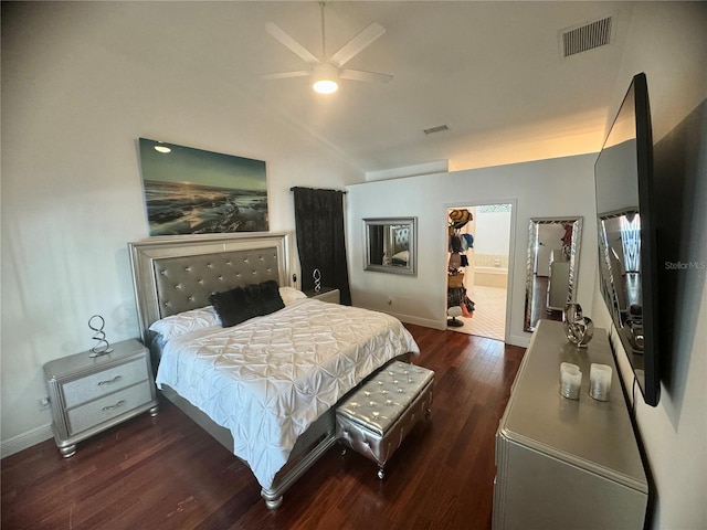 bedroom with ceiling fan and dark hardwood / wood-style flooring