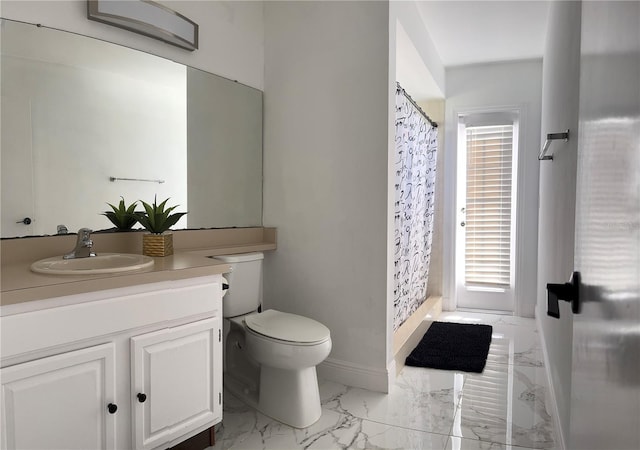 bathroom with vanity, toilet, and a shower with shower curtain