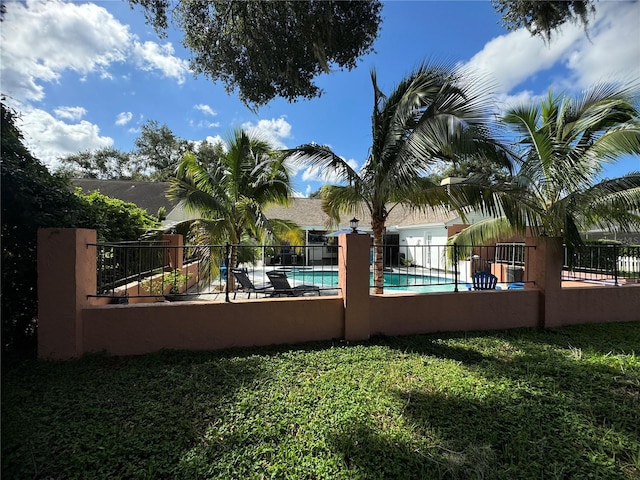 view of yard featuring a community pool