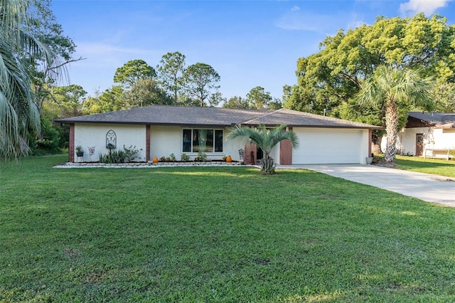 single story home featuring a garage and a front yard