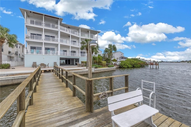 view of dock with a water view