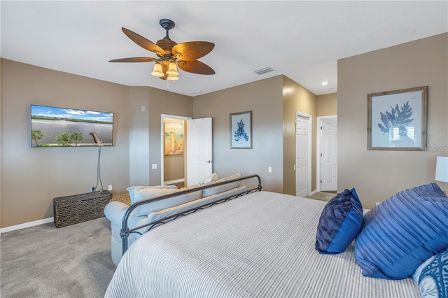 carpeted bedroom with a closet and ceiling fan