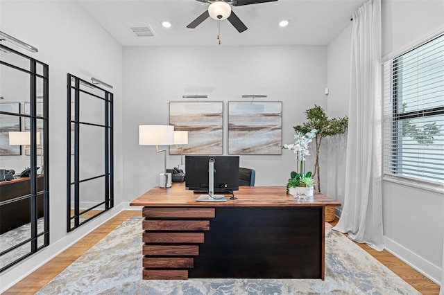 office area featuring light wood-type flooring and ceiling fan