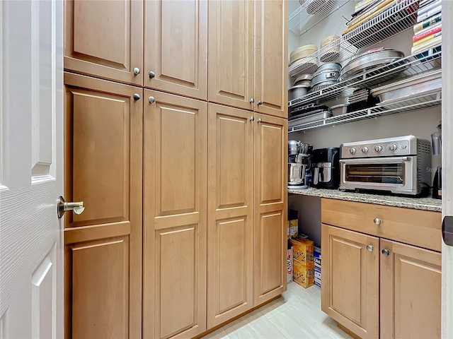 kitchen with light stone counters