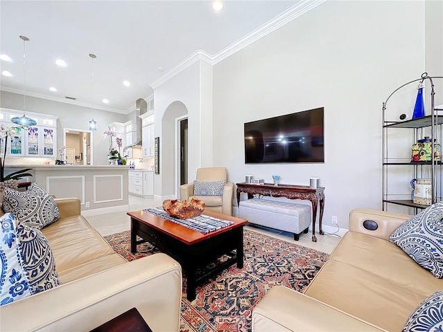 tiled living room featuring crown molding