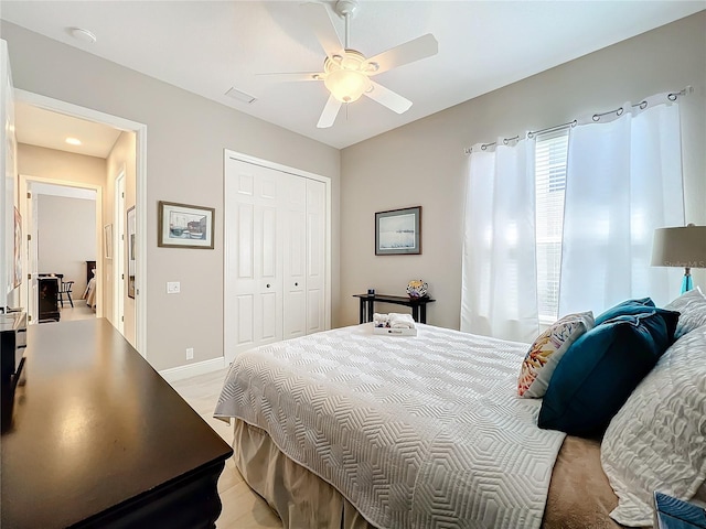 bedroom with a closet and ceiling fan