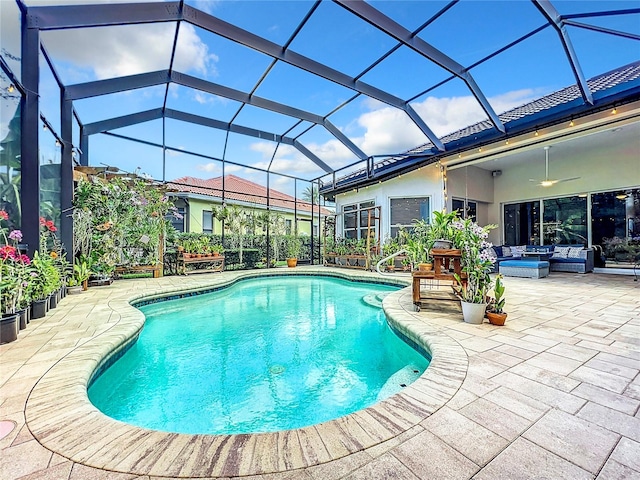 view of pool featuring a patio, an outdoor hangout area, a lanai, and ceiling fan