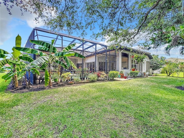 view of yard with glass enclosure