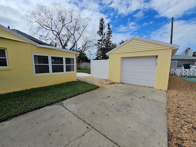 garage with a lawn