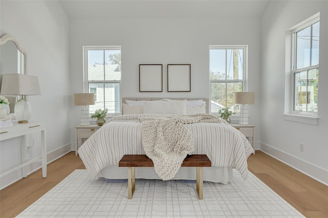 bedroom with light hardwood / wood-style flooring