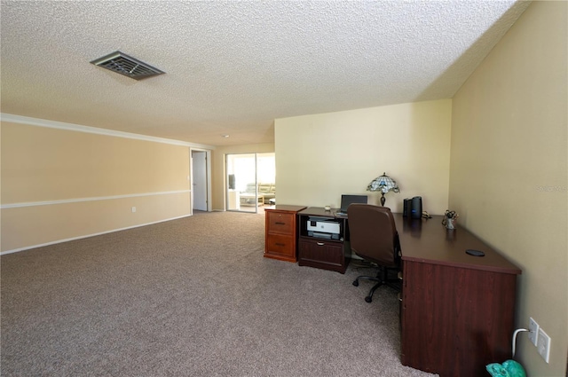 home office featuring visible vents, dark carpet, and a textured ceiling