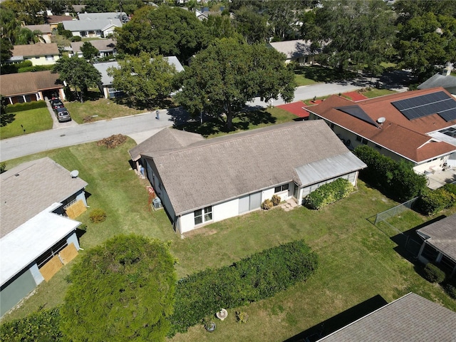 birds eye view of property with a residential view