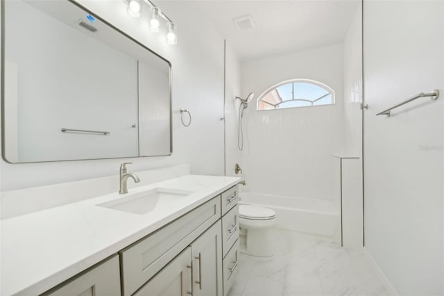 18051 Java Isle Dr, Tampa, FL 33647 - bathroom featuring marble look tile flooring, vanity, shower / bath combination, and toilet