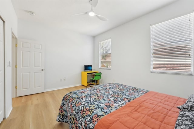 bedroom featuring ceiling fan and wood-type flooring