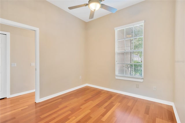 unfurnished room with hardwood / wood-style floors and ceiling fan