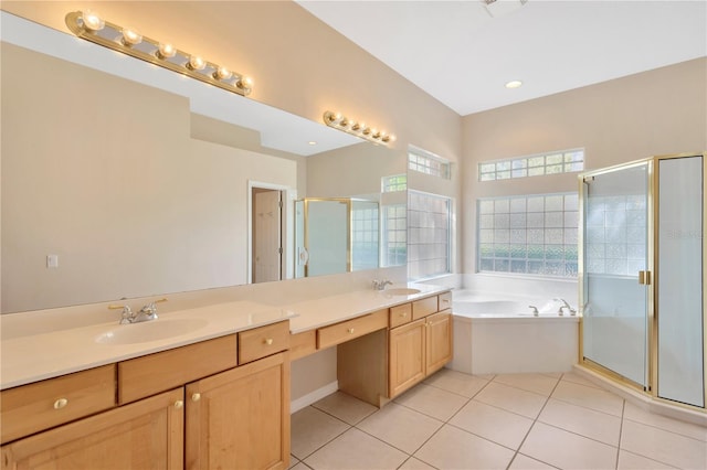 bathroom featuring vanity, shower with separate bathtub, and tile patterned flooring