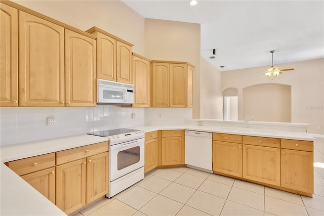 kitchen with backsplash, light tile patterned floors, light brown cabinetry, white appliances, and ceiling fan