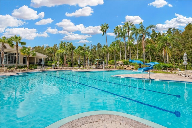 view of pool featuring a water slide