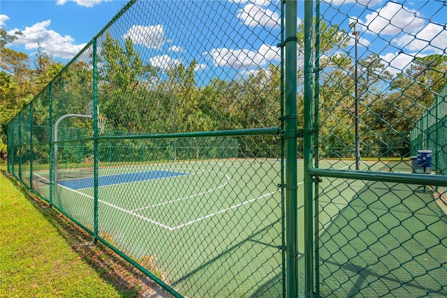 view of basketball court with tennis court