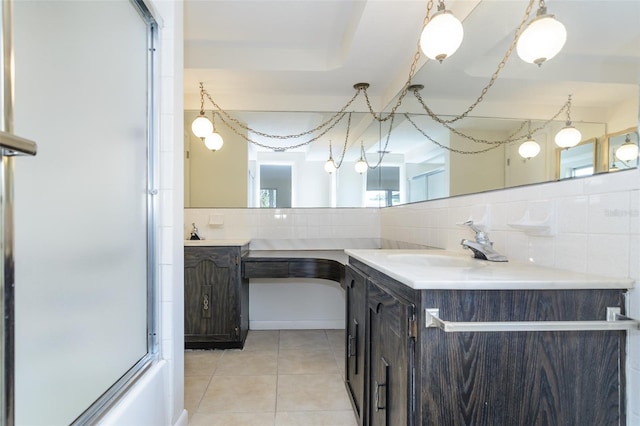 bathroom featuring tile patterned floors, an enclosed shower, backsplash, and vanity