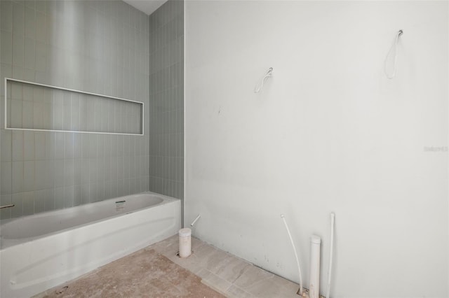 bathroom with tiled shower / bath combo