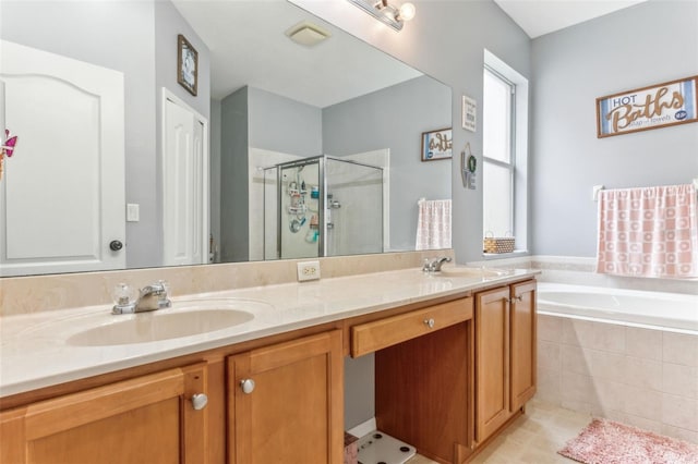 bathroom with vanity, shower with separate bathtub, and tile patterned floors