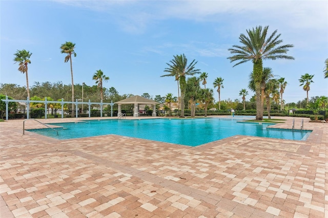 view of pool featuring a patio and a gazebo