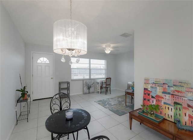 2960 59th St S Unit 509, Gulfport, FL 33707 - living room with a chandelier, light tile patterned floors, and baseboards