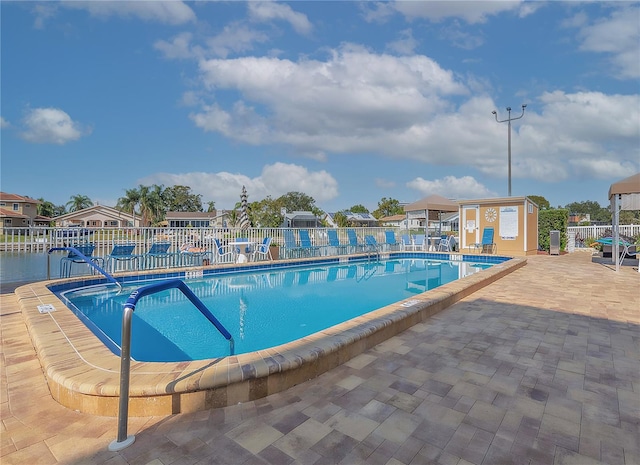 view of swimming pool featuring a patio