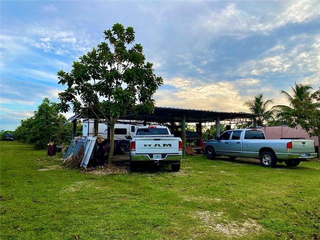 parking at dusk with a lawn