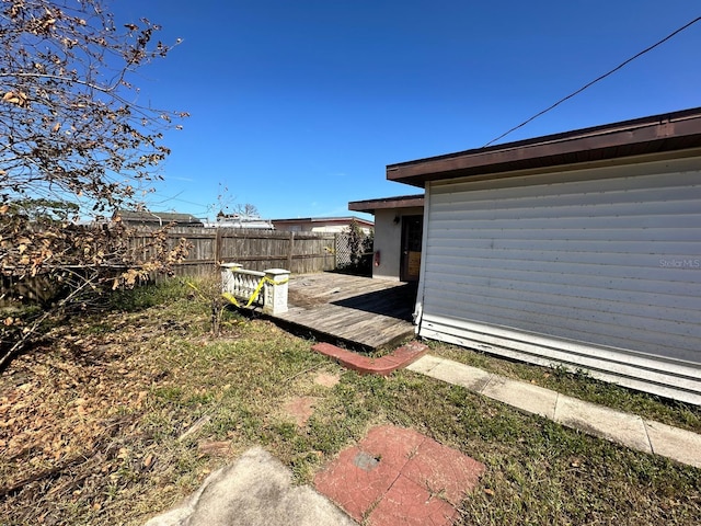 view of yard with a wooden deck