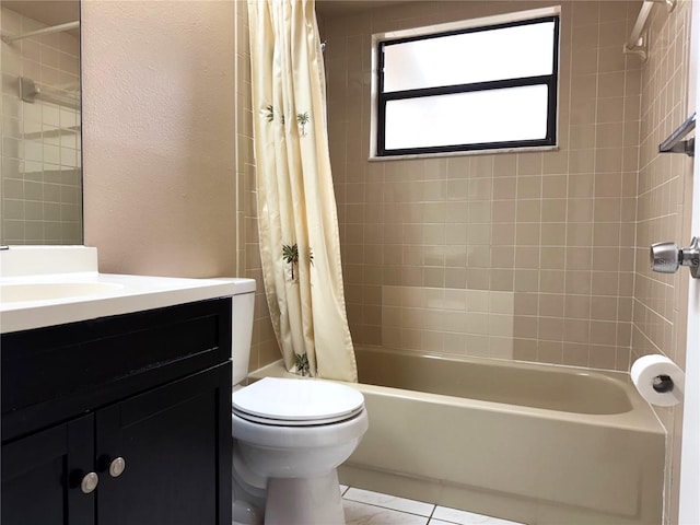 full bathroom with toilet, shower / bath combo, vanity, and tile patterned floors