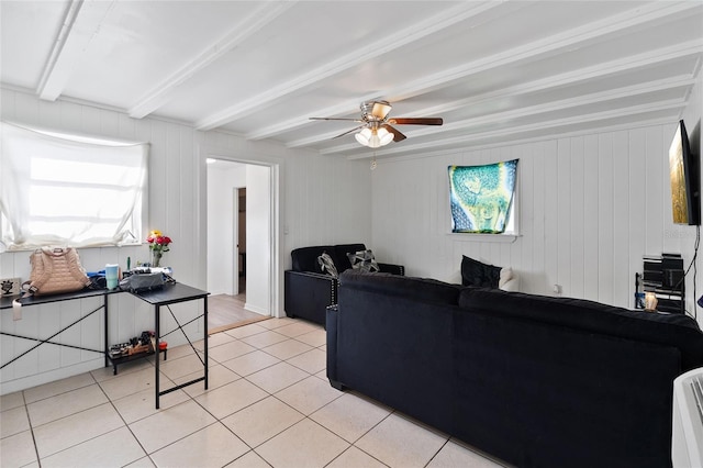 205 Santurce Ave, North Port, FL 34287 - living area featuring light tile patterned floors, beamed ceiling, and a ceiling fan