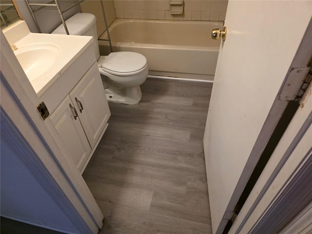 304 Camillia Ln Unit B, Port Charlotte, FL 33954 - full bath featuring wood finished floors, toilet, and vanity