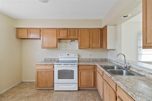 kitchen with white electric stove, sink, a textured ceiling, and light tile patterned floors