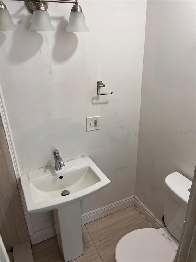 bathroom featuring toilet