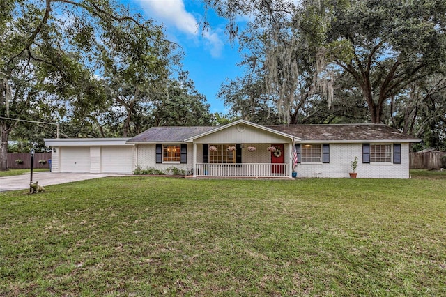 single story home with a garage, a front lawn, and a porch