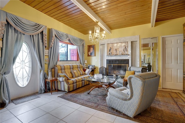 tiled living room featuring vaulted ceiling with beams, a notable chandelier, wooden ceiling, and a premium fireplace