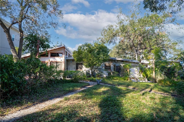 exterior space with a front lawn