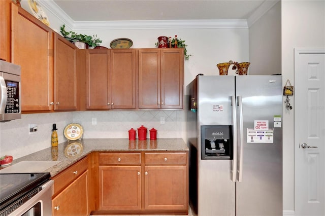 kitchen featuring tasteful backsplash, ornamental molding, brown cabinets, stainless steel appliances, and stone counters