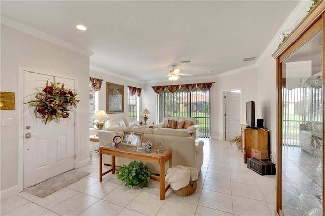 tiled living room featuring ceiling fan and crown molding