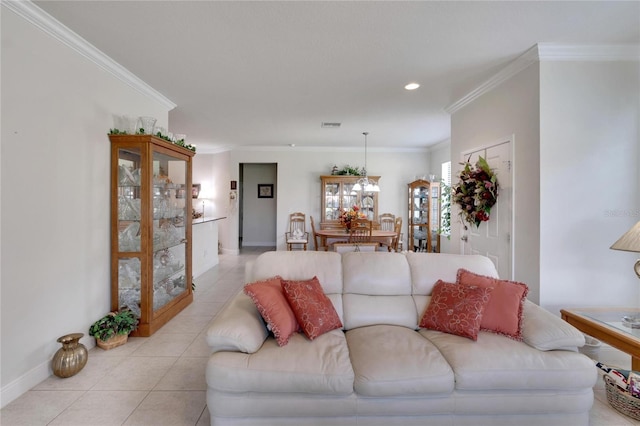 living area featuring light tile patterned floors, ornamental molding, visible vents, recessed lighting, and baseboards