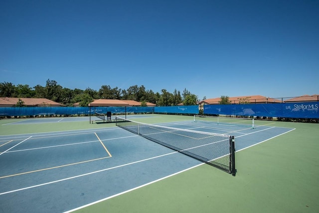 view of sport court with fence and community basketball court