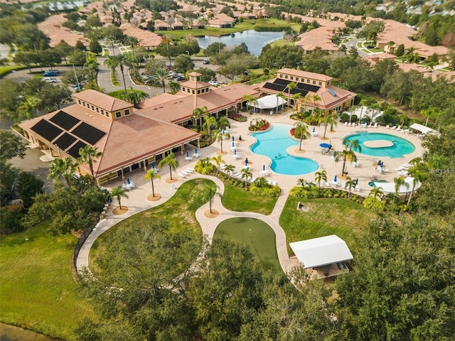 drone / aerial view with a water view