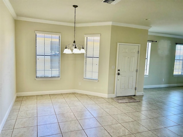 interior space with light tile patterned floors, crown molding, and a wealth of natural light