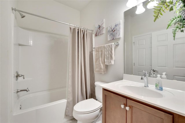 full bathroom featuring shower / bathtub combination with curtain, vanity, and toilet